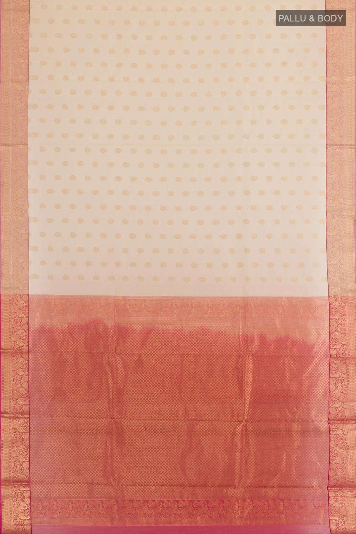 Flat view of Cream Silk Cotton Saree with Zari Butta on the body and Zari Border. 