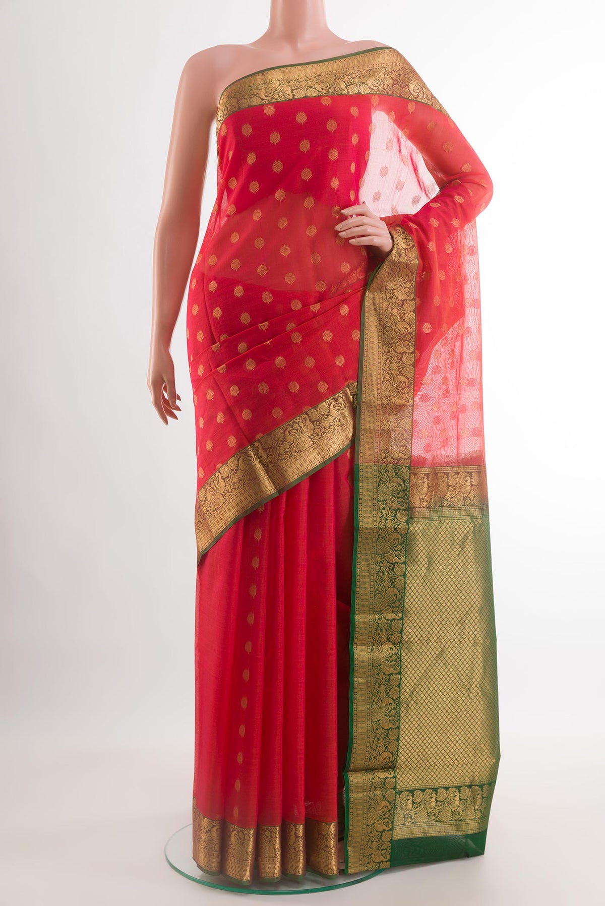 Pink Blended Kora Cotton Saree with Zari Butta on the body and Zari Border.  displayed on a mannequin