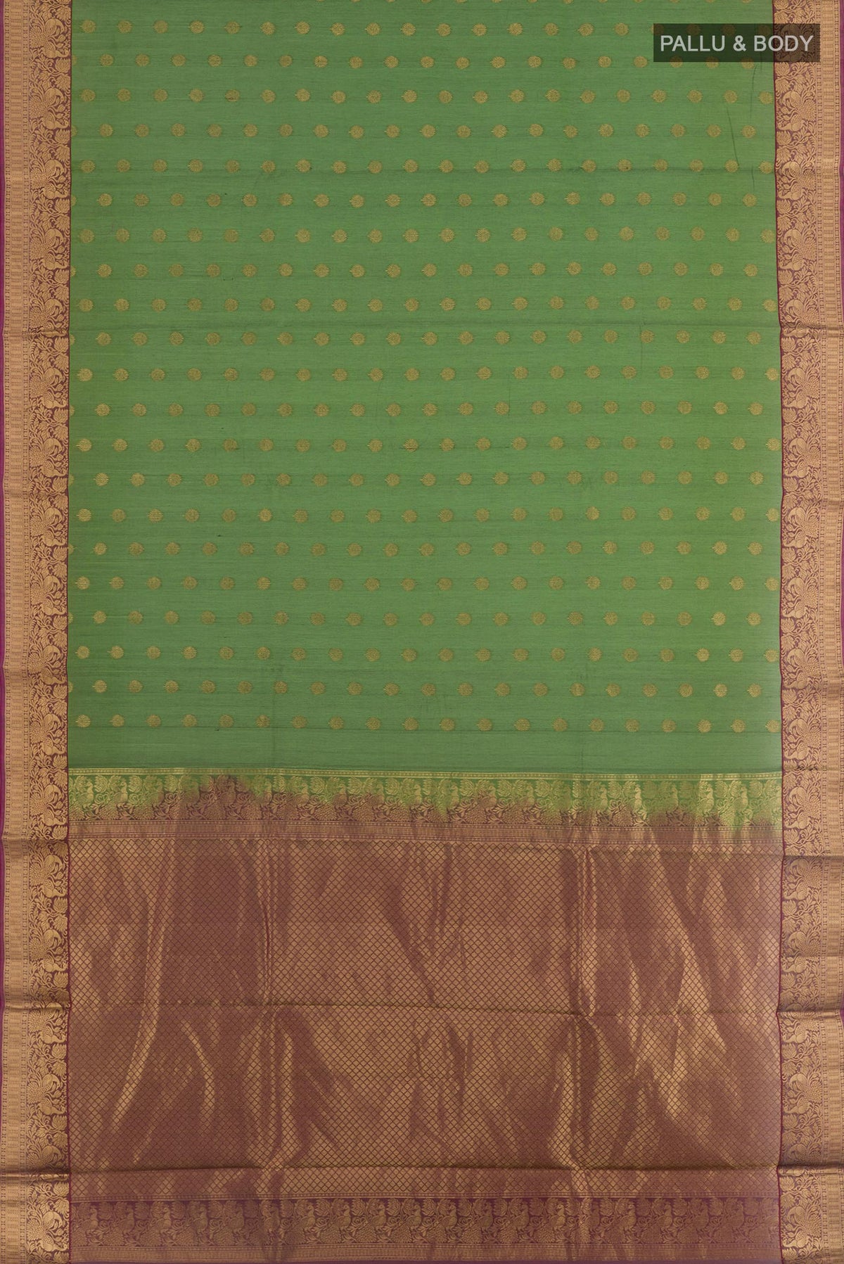 Flat view of Green Silk Cotton Saree with Zari Butta on the body and Zari Border. 