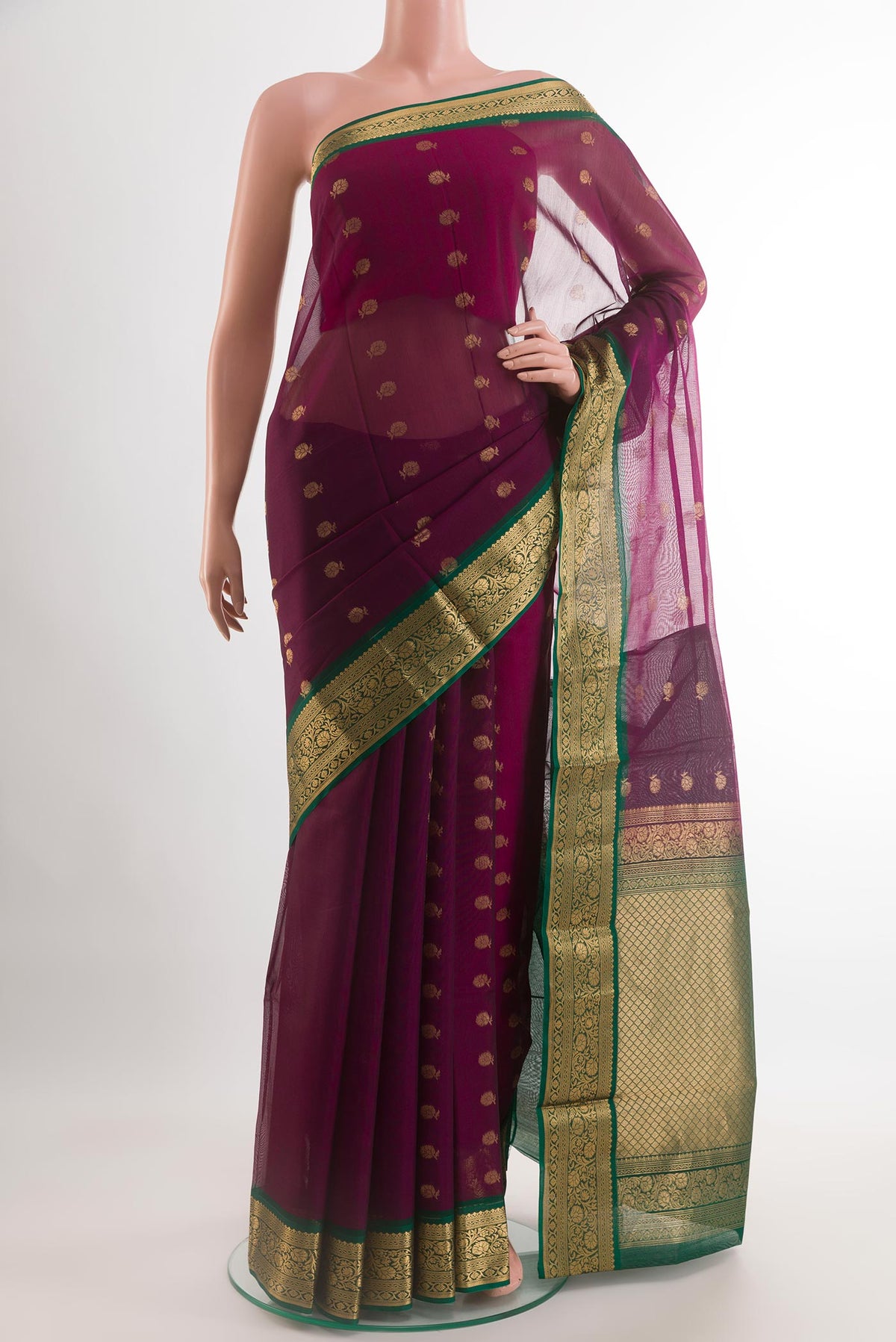Purple Blended Kora Cotton Saree with Zari Butta on the body and Zari Border.  displayed on a mannequin