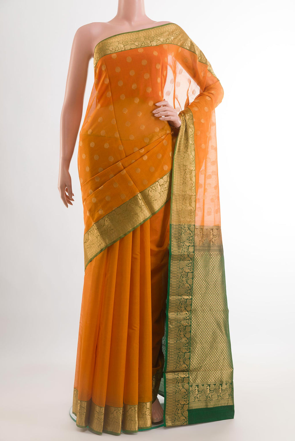 Orange Blended Kora Cotton Saree with Zari Butta on the body and Zari Border.  displayed on a mannequin