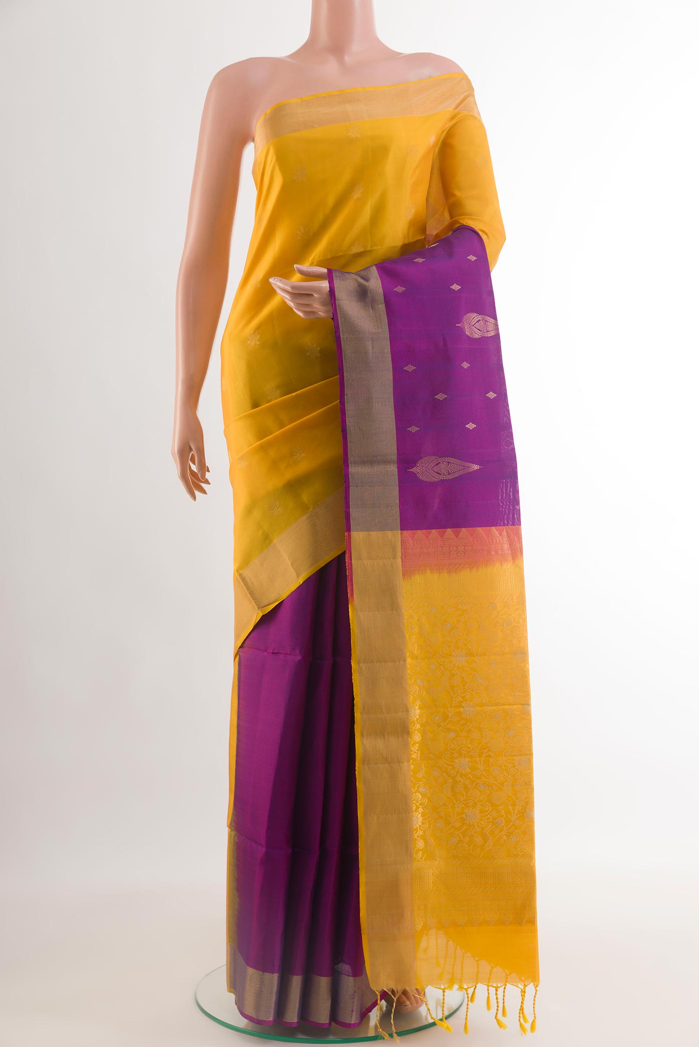 Multi Color Soft Silk Saree with Half And Half on the body and Zari Border.  displayed on a mannequin