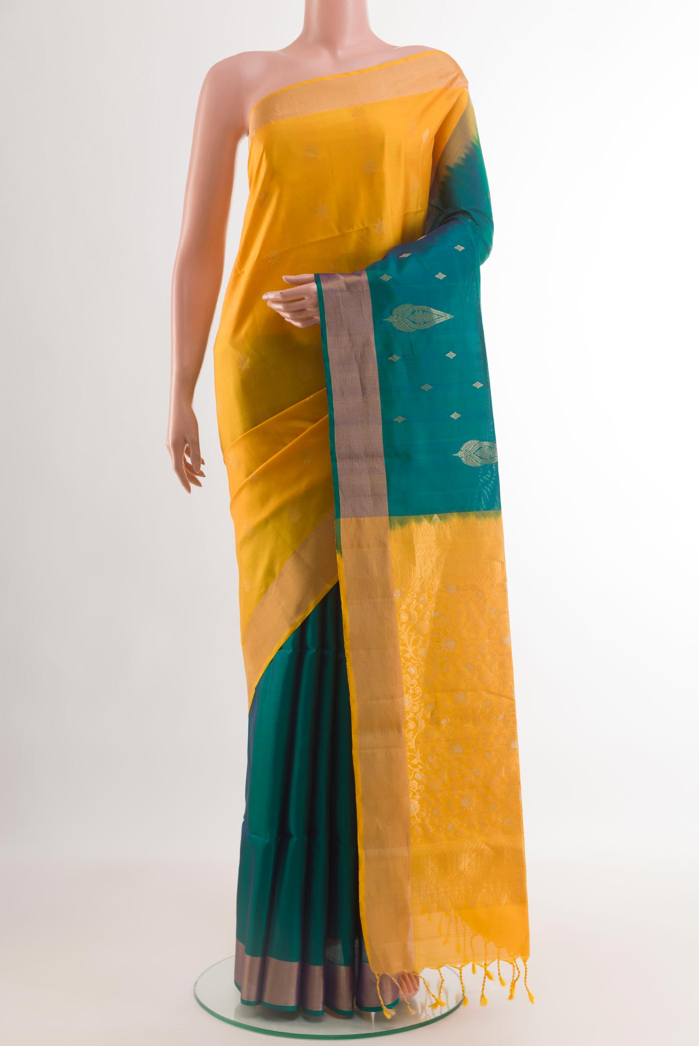 Multi Color Soft Silk Saree with Half And Half on the body and Zari Border.  displayed on a mannequin