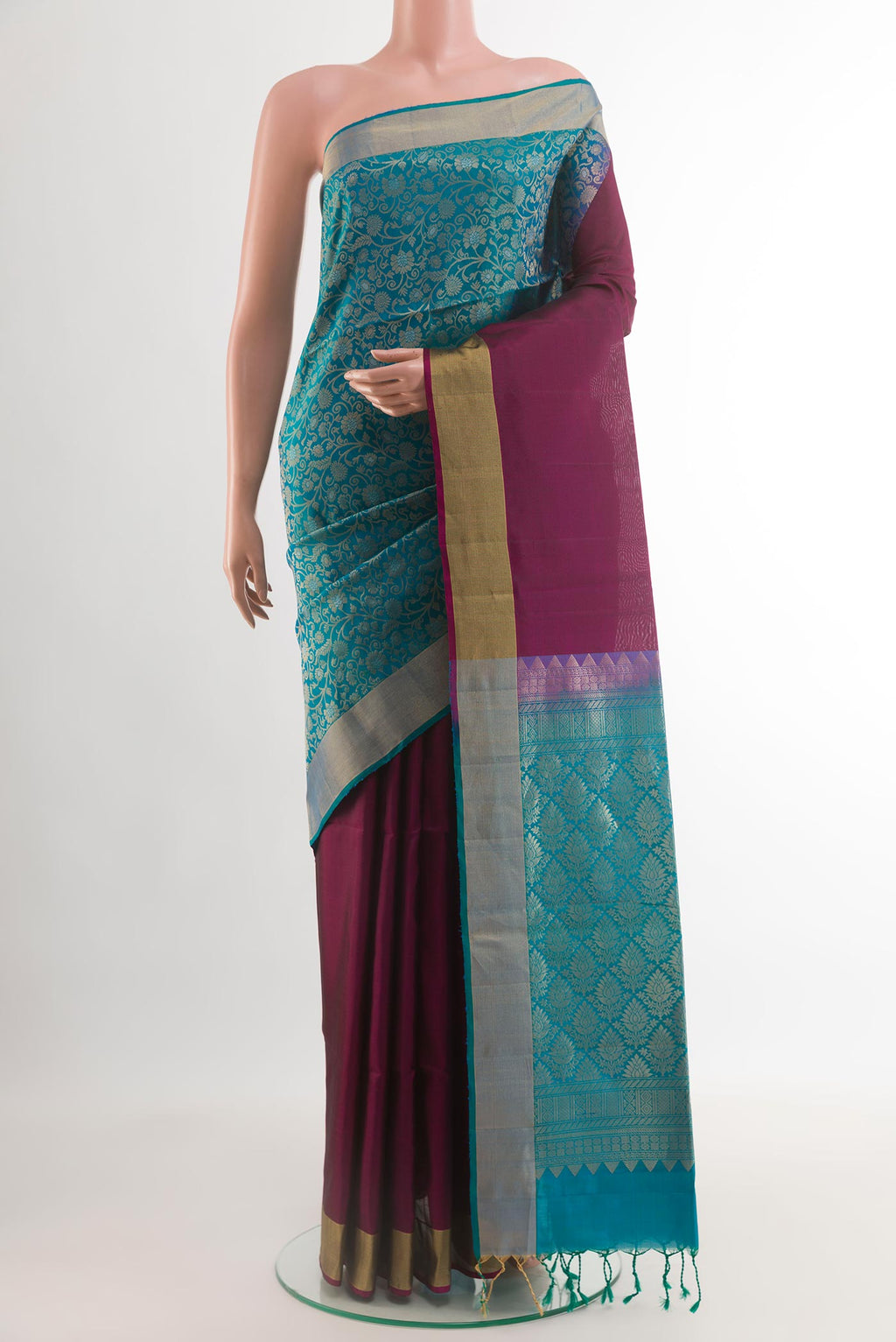 Multi Color Soft Silk Saree with Half And Half on the body and Zari Border.  displayed on a mannequin