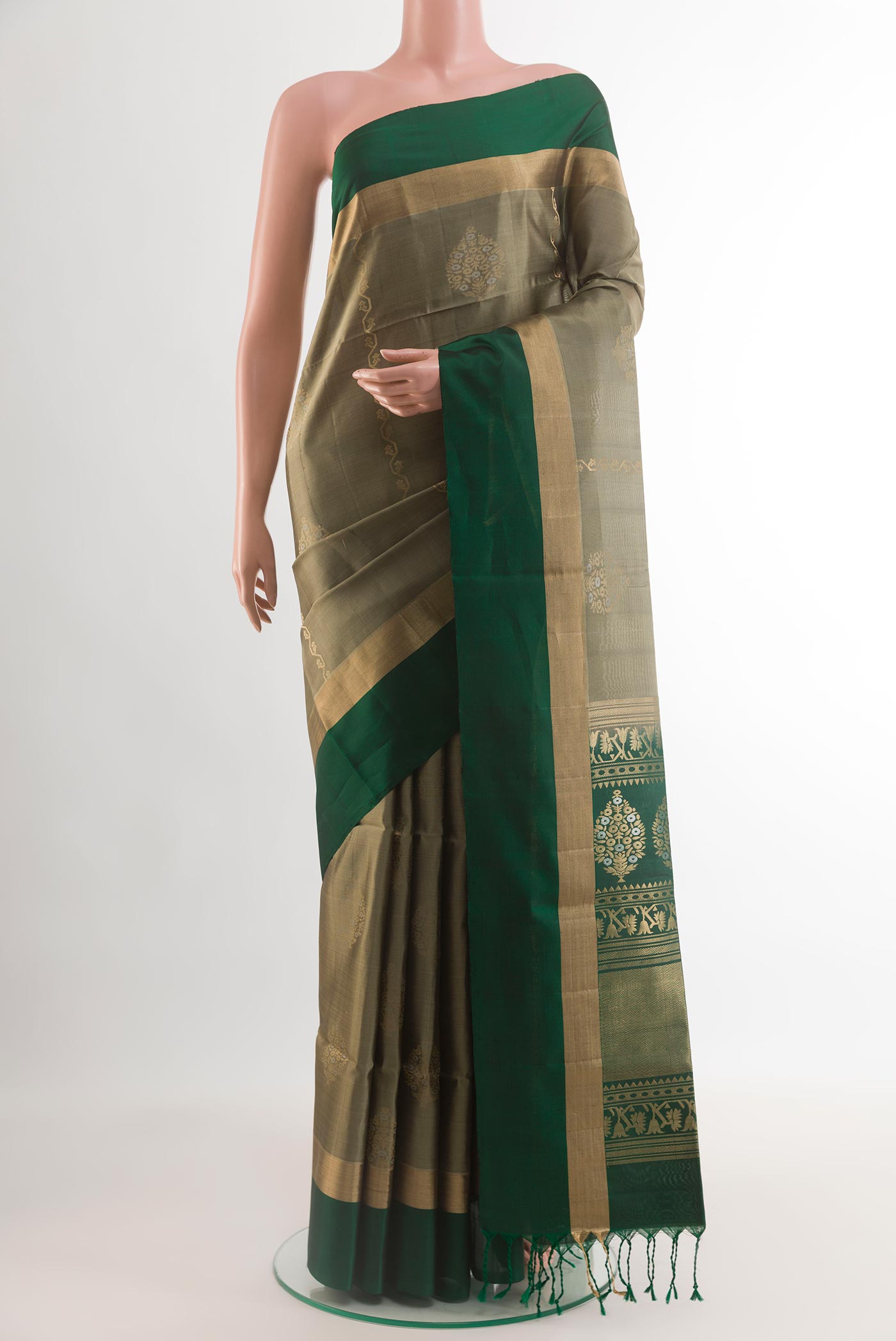 Grey Soft Silk Saree with Zari Butta on the body and Zari Border.  displayed on a mannequin