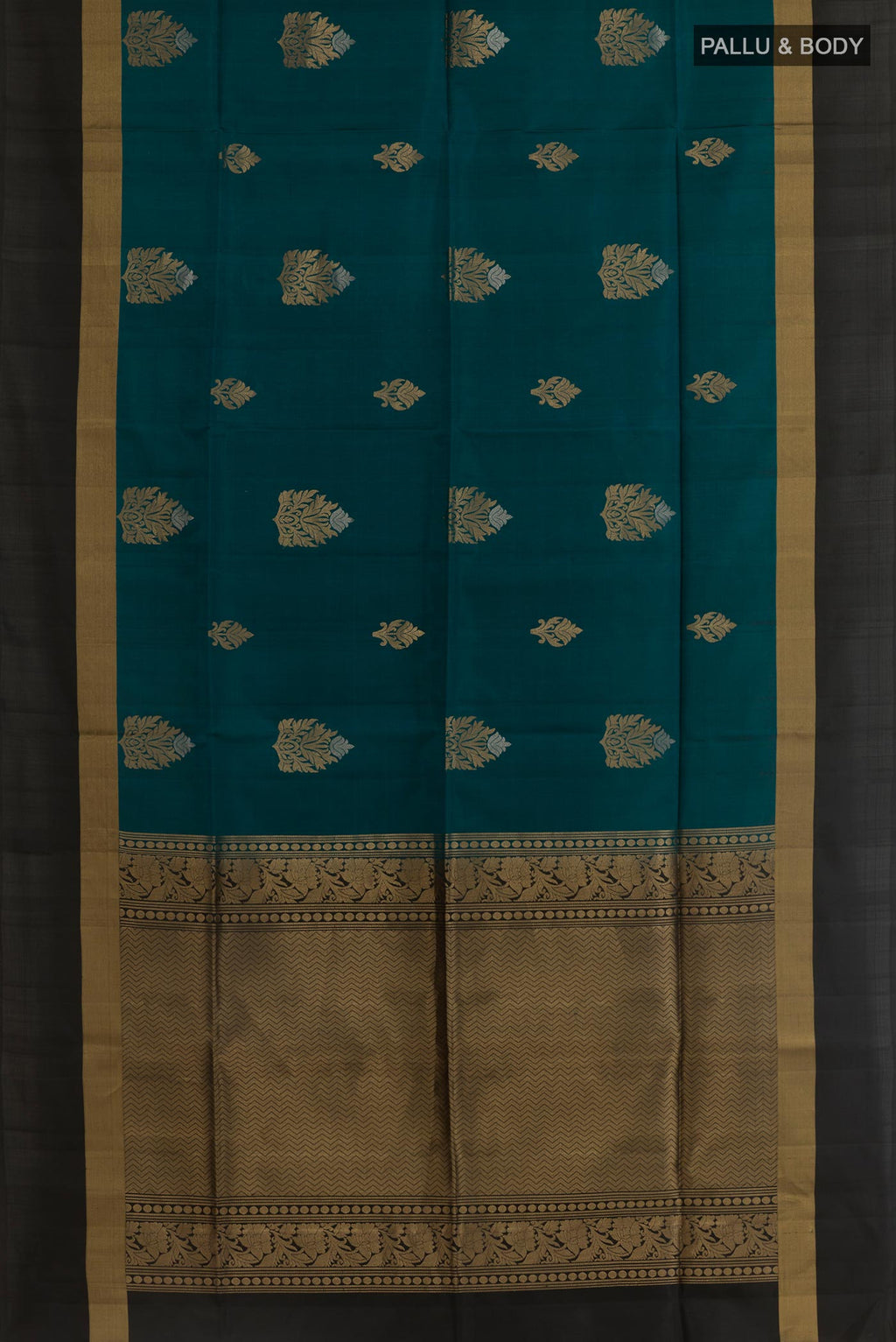 Flat view of Teal Soft Silk Saree with Zari Butta on the body and Zari Border. 