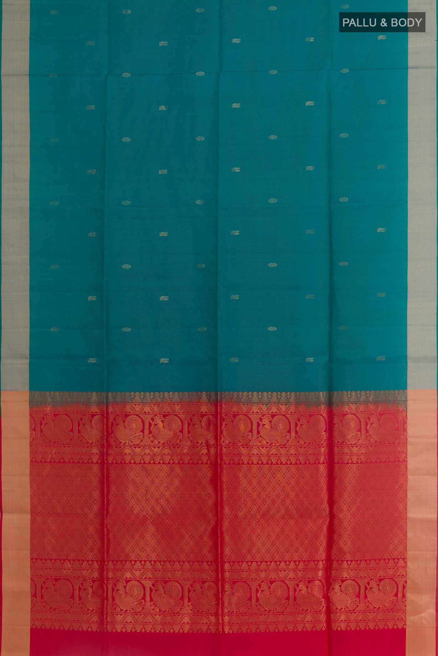 Flat view of Peacock Blue Soft Silk Saree with Zari Butta on the body and Zari Border. 