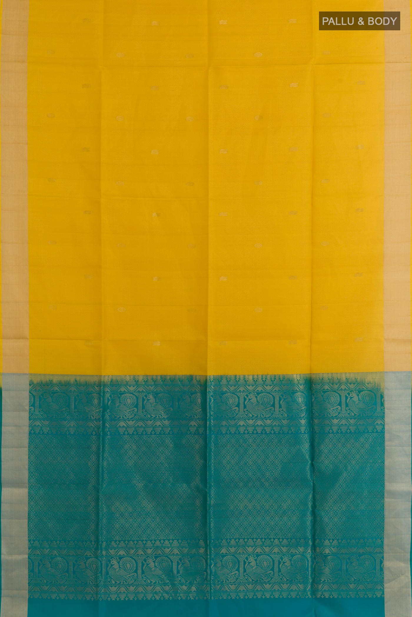 Flat view of Yellow Soft Silk Saree with Zari Butta on the body and Zari Border. 