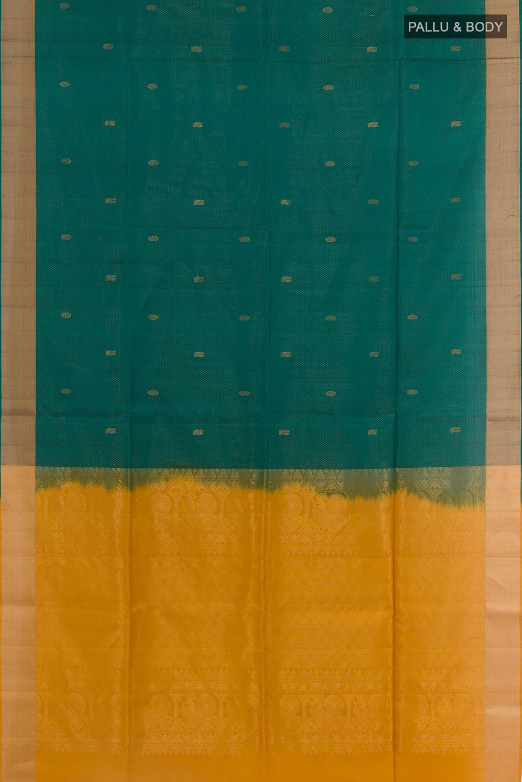 Flat view of Teal Soft Silk Saree with Zari Butta on the body and Zari Border. 