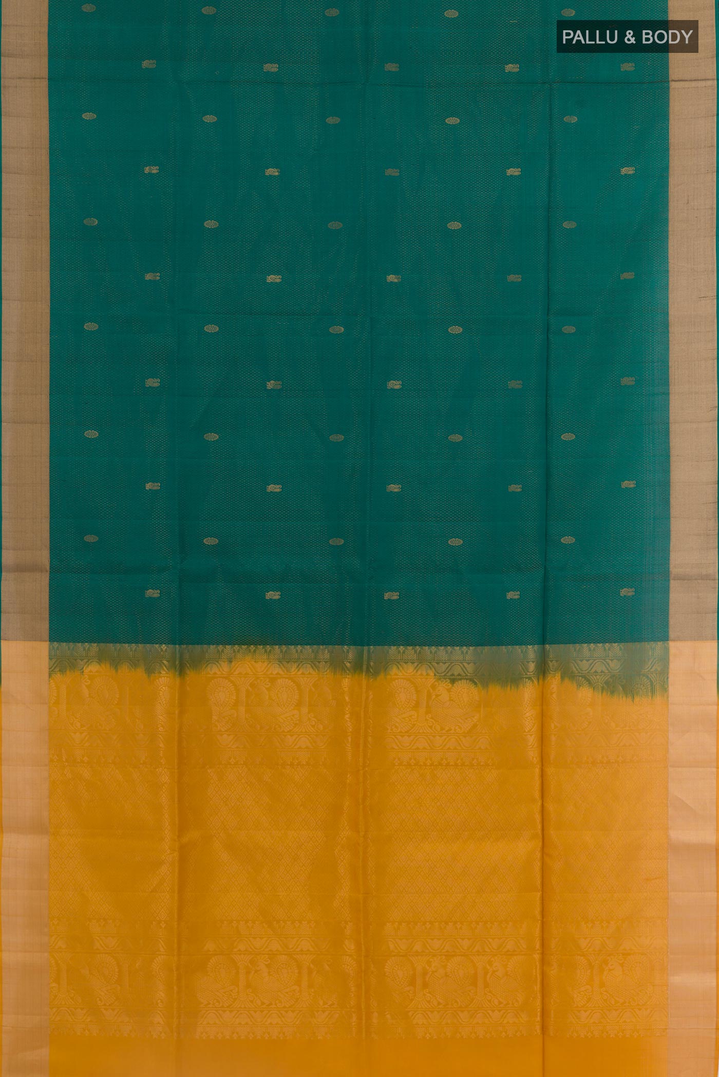 Flat view of Teal Soft Silk Saree with Zari Butta on the body and Zari Border. 