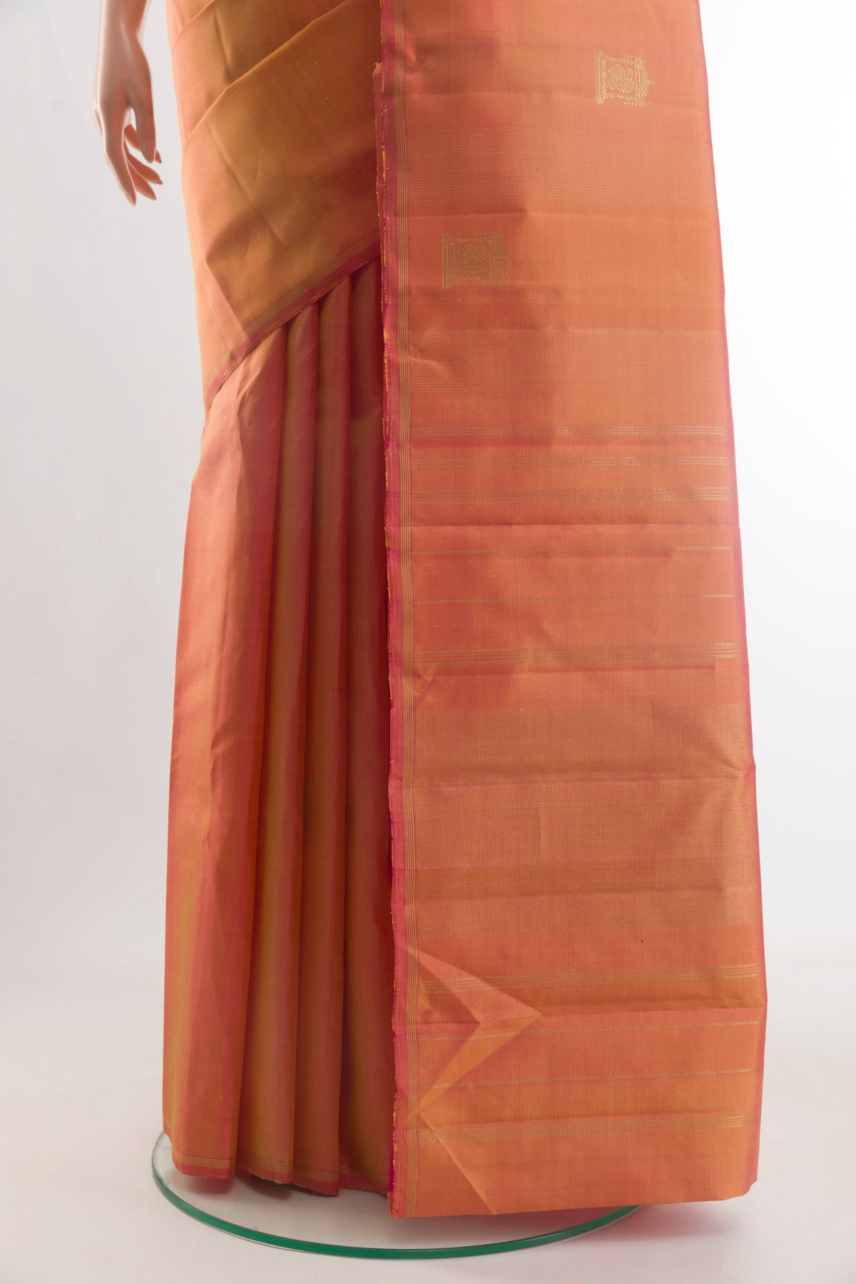 Pleats and pallu of Pinkish Yellow Dual Tone Kanjivaram Silk Saree with Zari Butta on the body and Zari Border. 