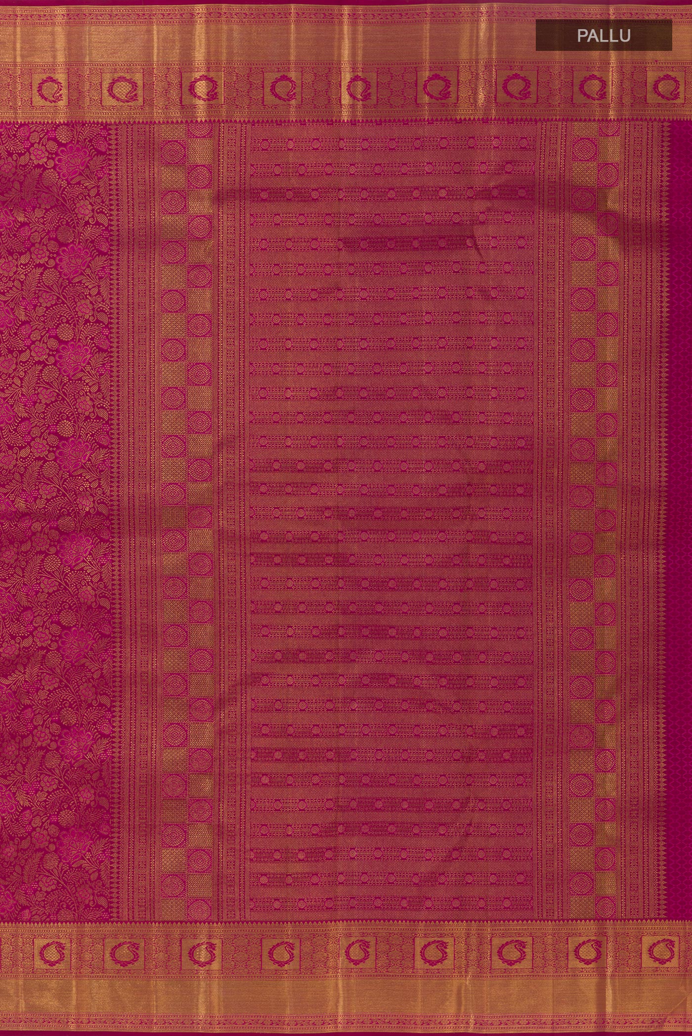Close up image of the pallu of Magenta Kanchipuram Silk Saree with Zari Brocade on the body and Zari Border. 