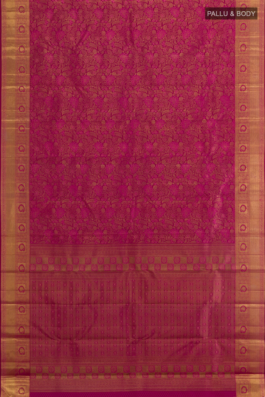 Flat view of Magenta Kanchipuram Silk Saree with Zari Brocade on the body and Zari Border. 