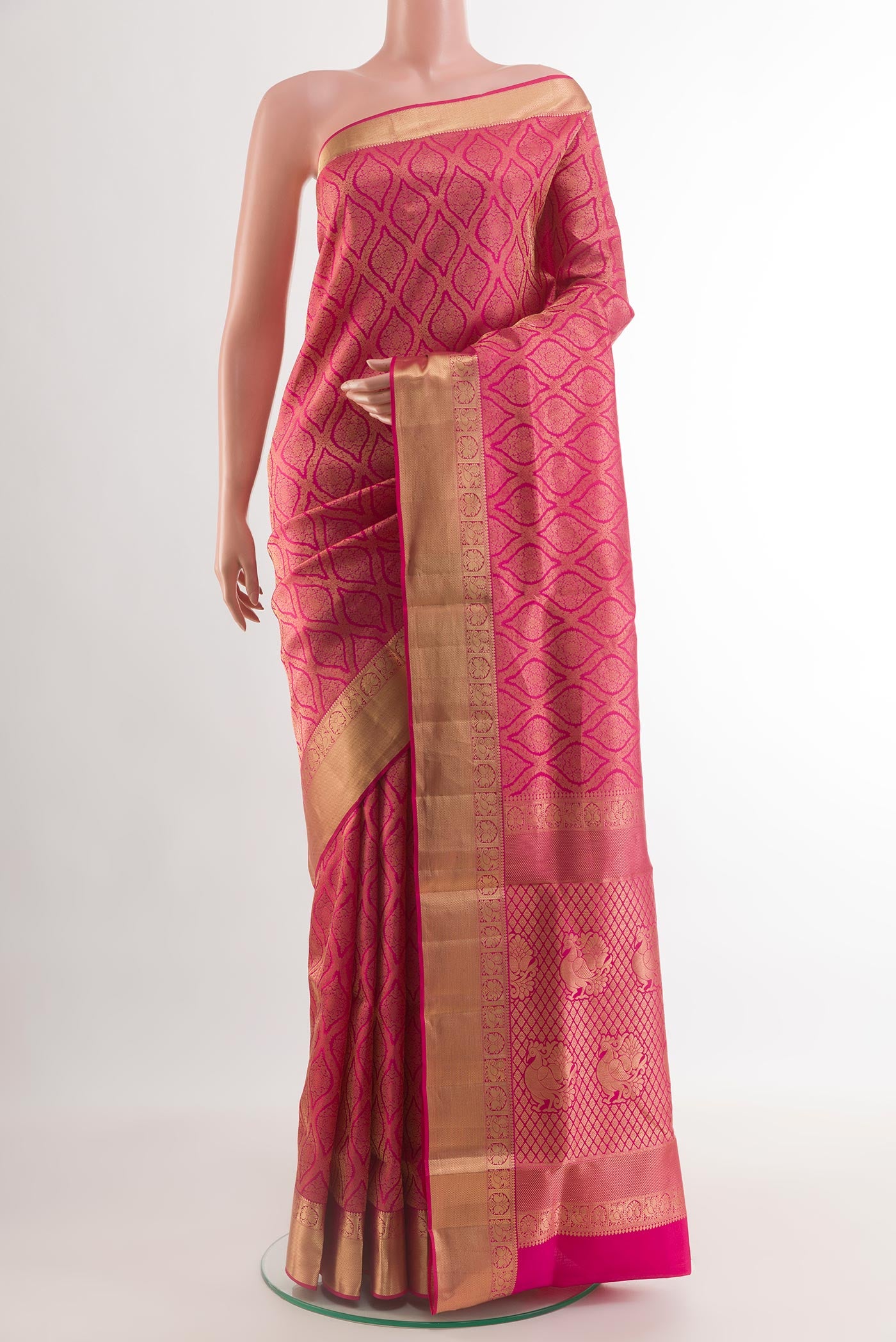 Pink Soft Silk Saree with Zari Brocade on the body and Zari Border.  displayed on a mannequin