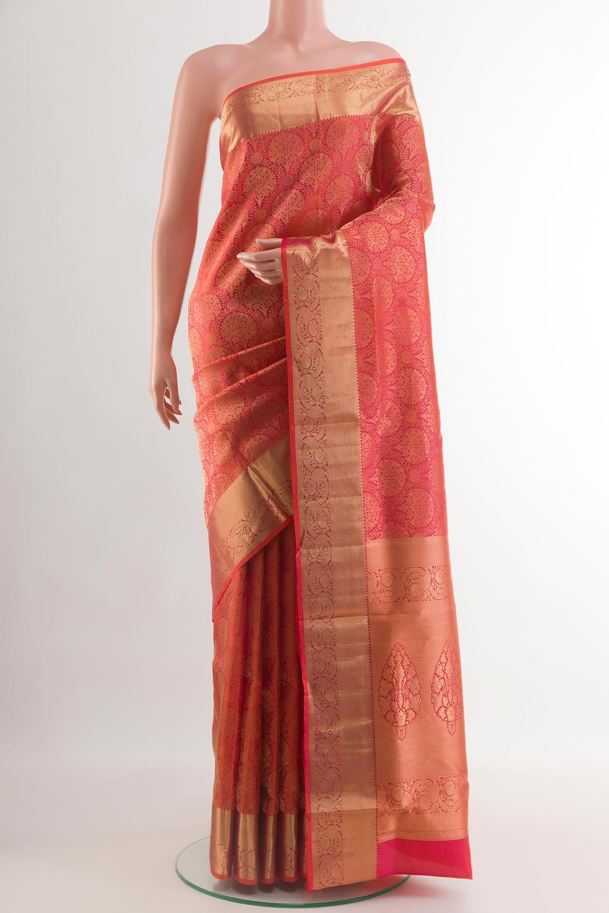 Pink with Orange Color Soft Silk Saree with Zari Brocade on the body and Zari Border.  displayed on a mannequin