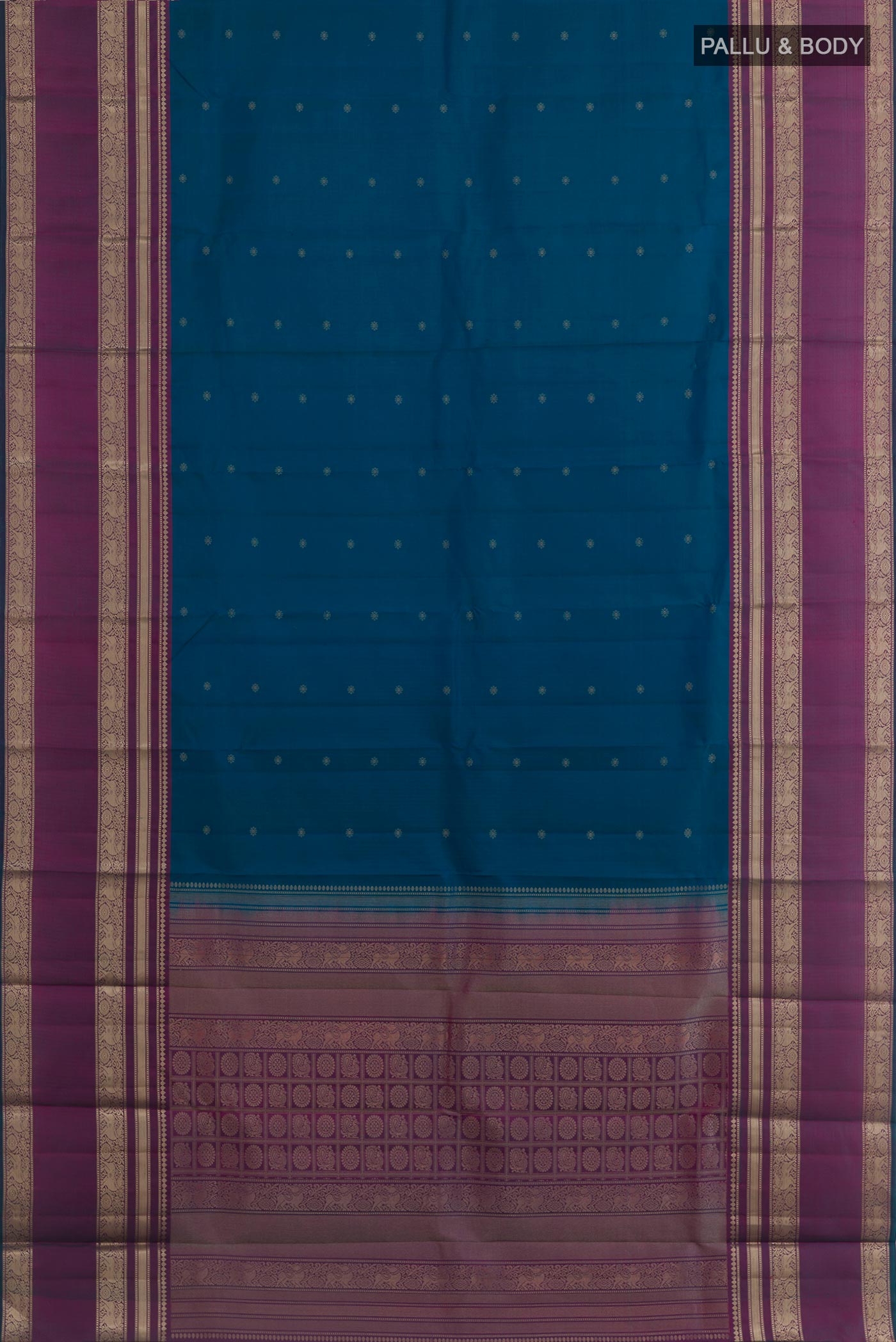 Flat view of Blue Kanchipuram Silk Saree with Zari Butta on the body and Zari Border. 