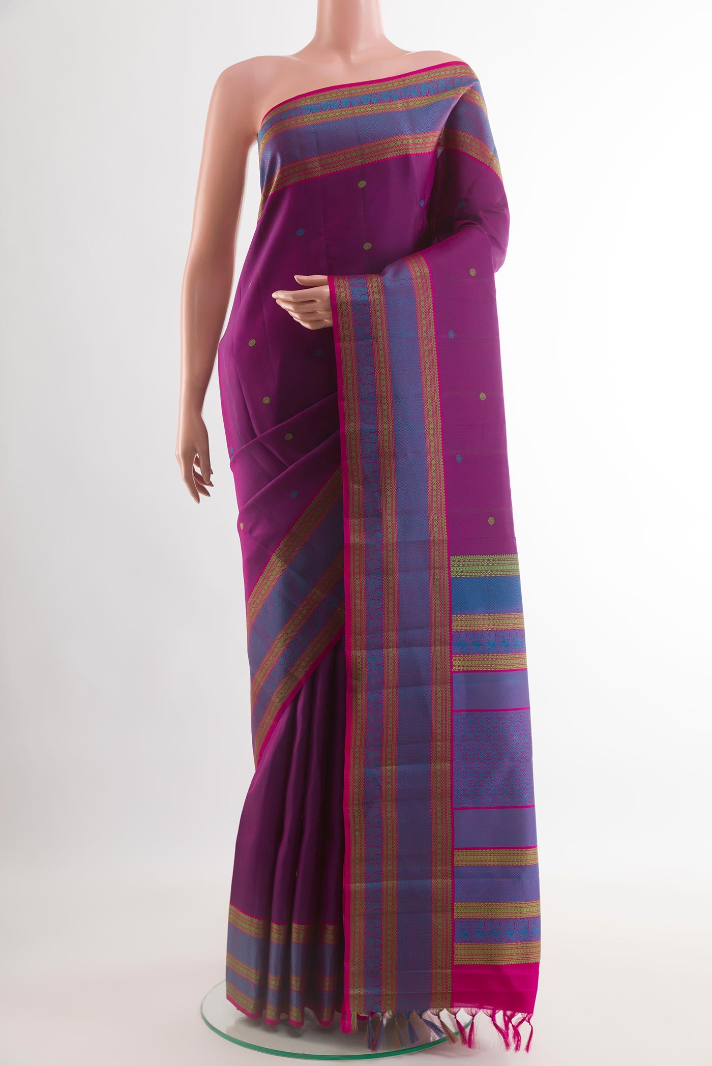 Purple Kanchipuram Silk Saree with Thread Butta on the body and Thread Border.  displayed on a mannequin