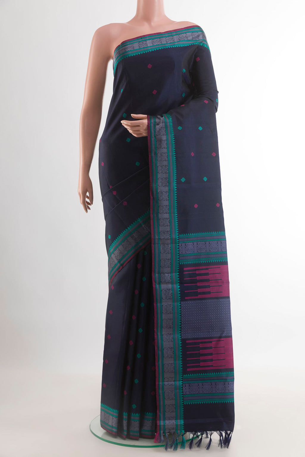 Navy Blue Kanchipuram Silk Saree with Thread Butta on the body and Thread Border.  displayed on a mannequin