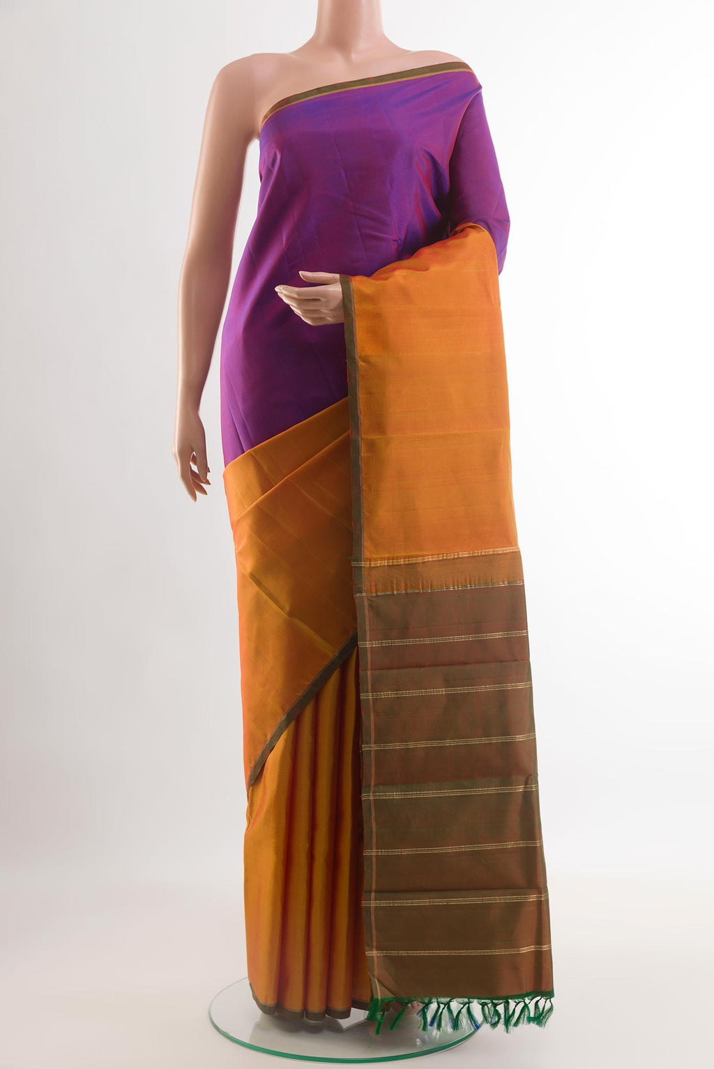 Multi Color Kanchipuram Silk Saree with Half And Half on the body and Without Border.  displayed on a mannequin