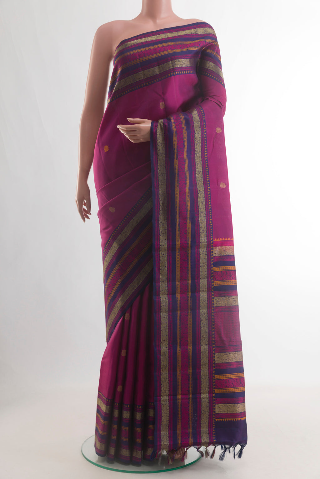 Purple Kanchipuram Silk Saree with Thread Butta on the body and Thread Border.  displayed on a mannequin