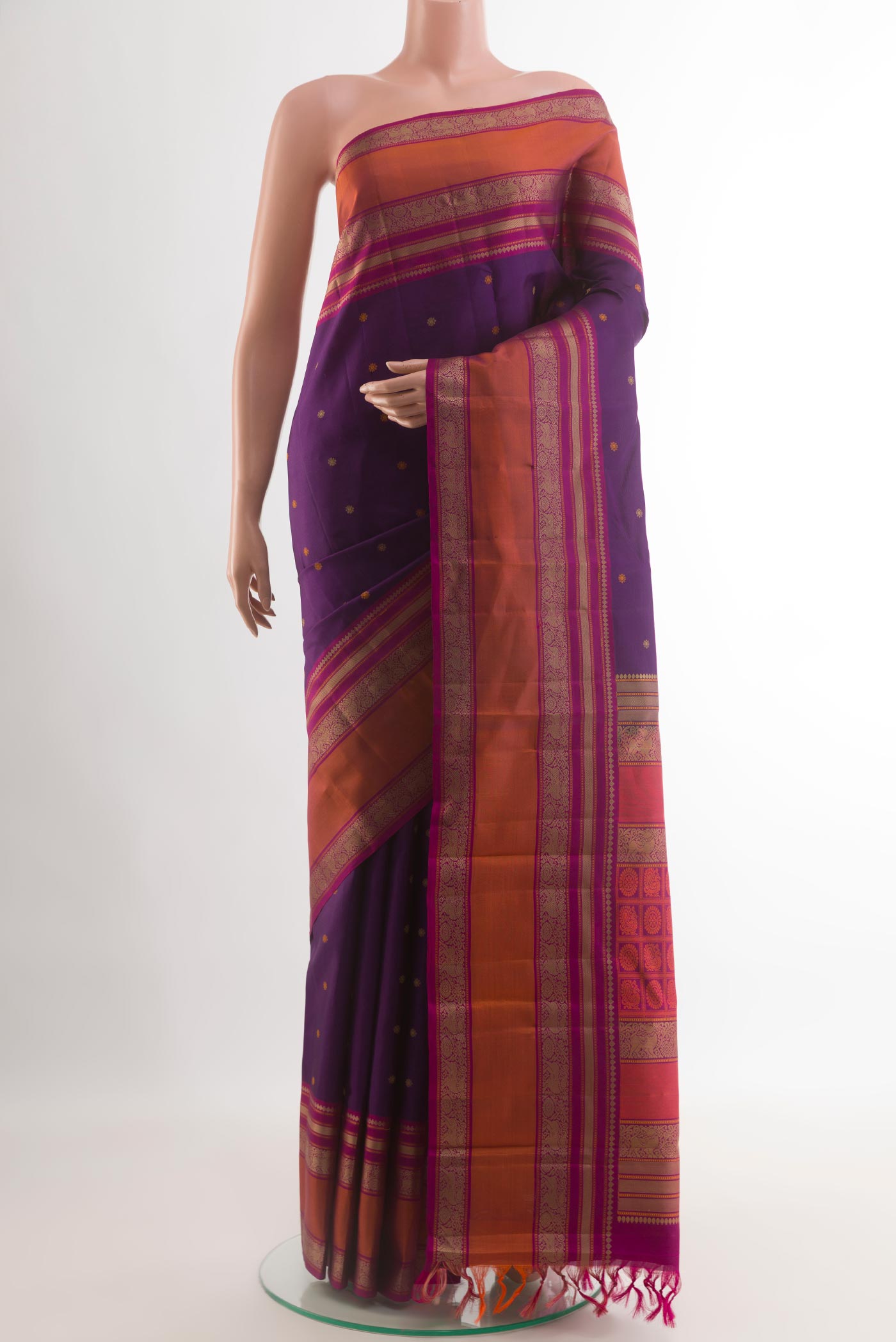 Purple Kanchipuram Silk Saree with Thread Butta on the body and Thread Border.  displayed on a mannequin