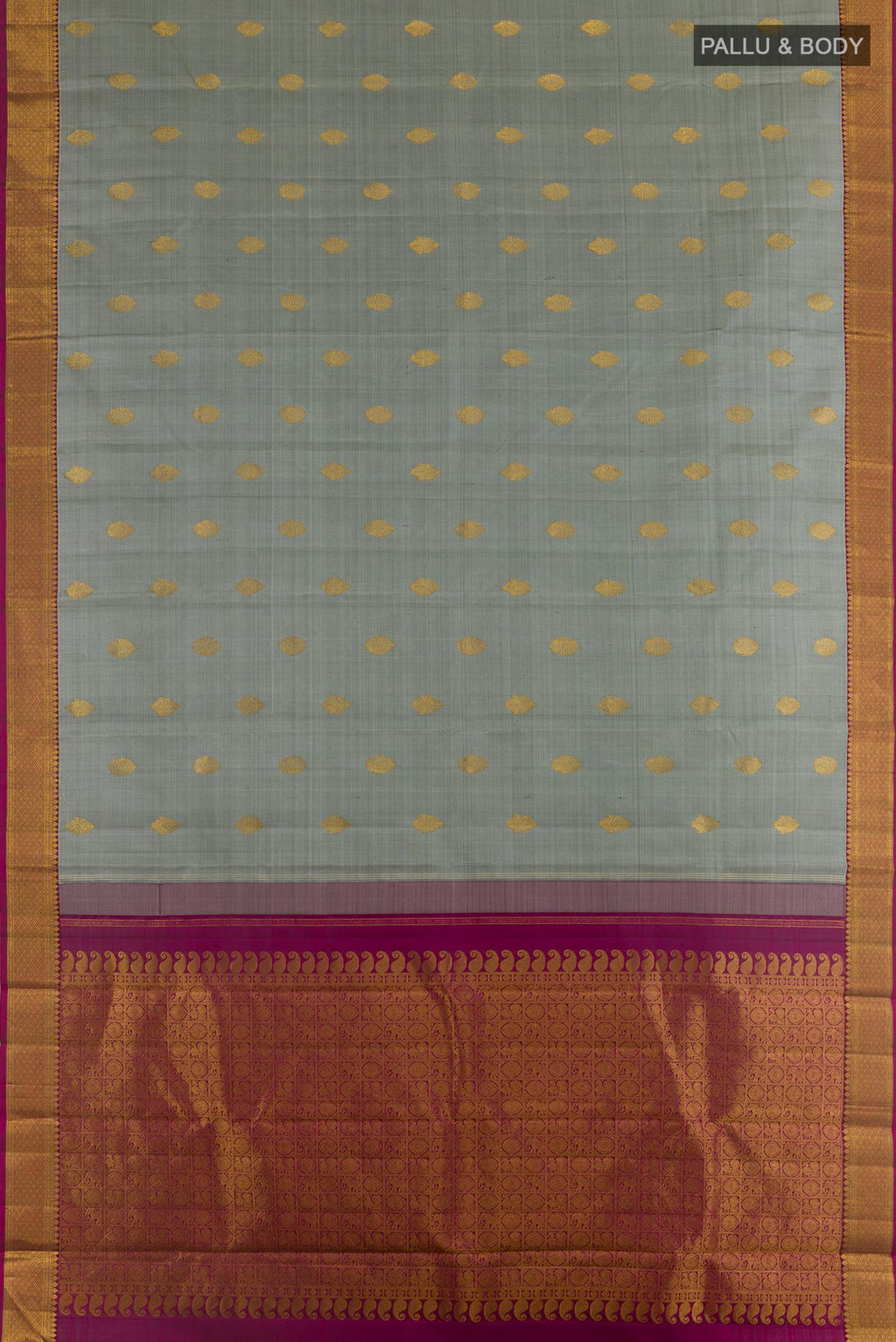 Flat view of Grey Kanchipuram Silk Saree with Zari Butta on the body and Zari Border. 