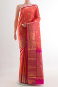 Coral Kanjivaram Silk Saree with Jacquard With Zari Butta on the body and Zari Border.  displayed on a mannequin
