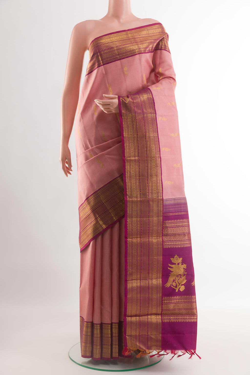 Imperial Pink Kanjivaram Silk Saree with Zari Butta on the body and Zari Border.  displayed on a mannequin