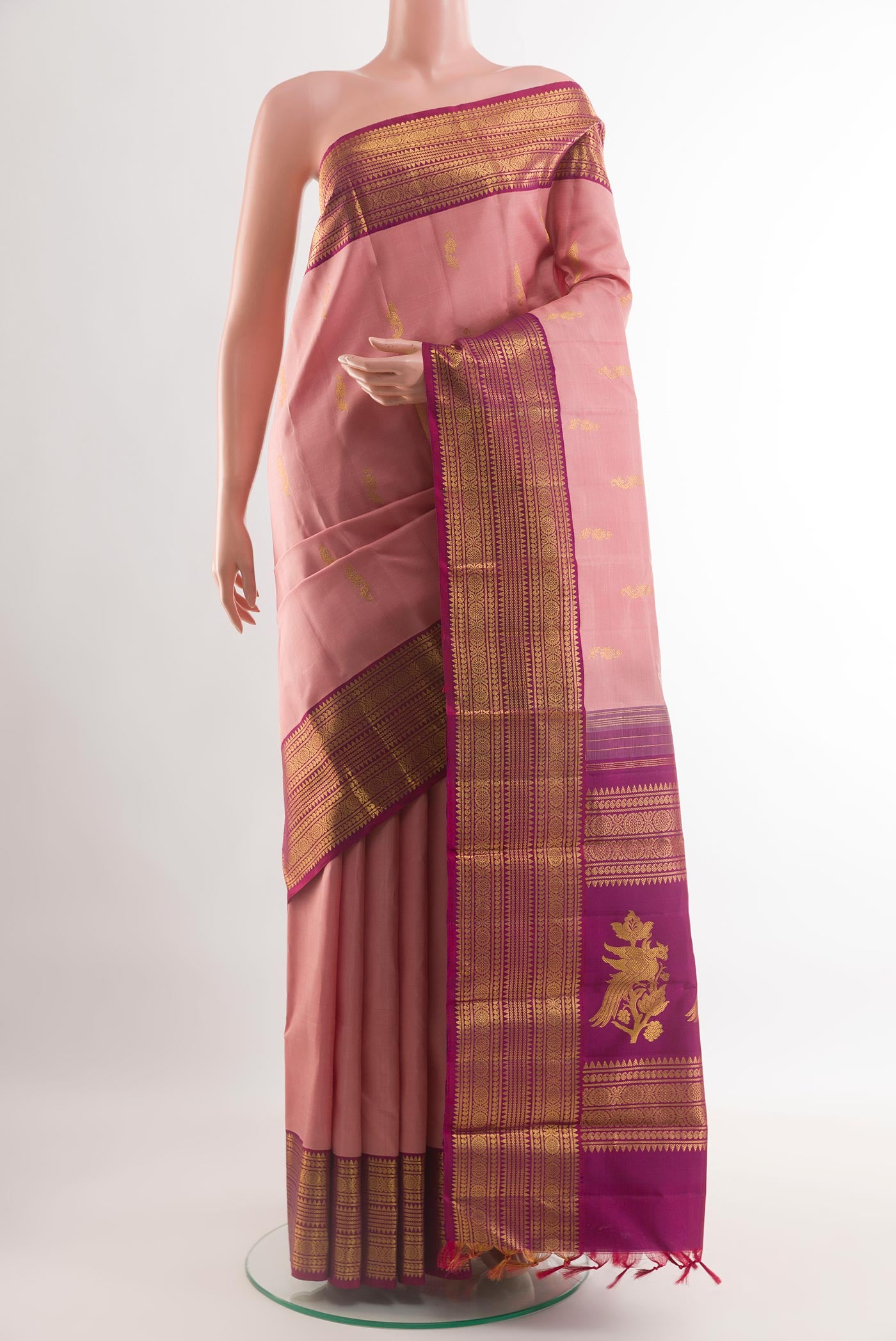 Imperial Pink Kanjivaram Silk Saree with Zari Butta on the body and Zari Border.  displayed on a mannequin