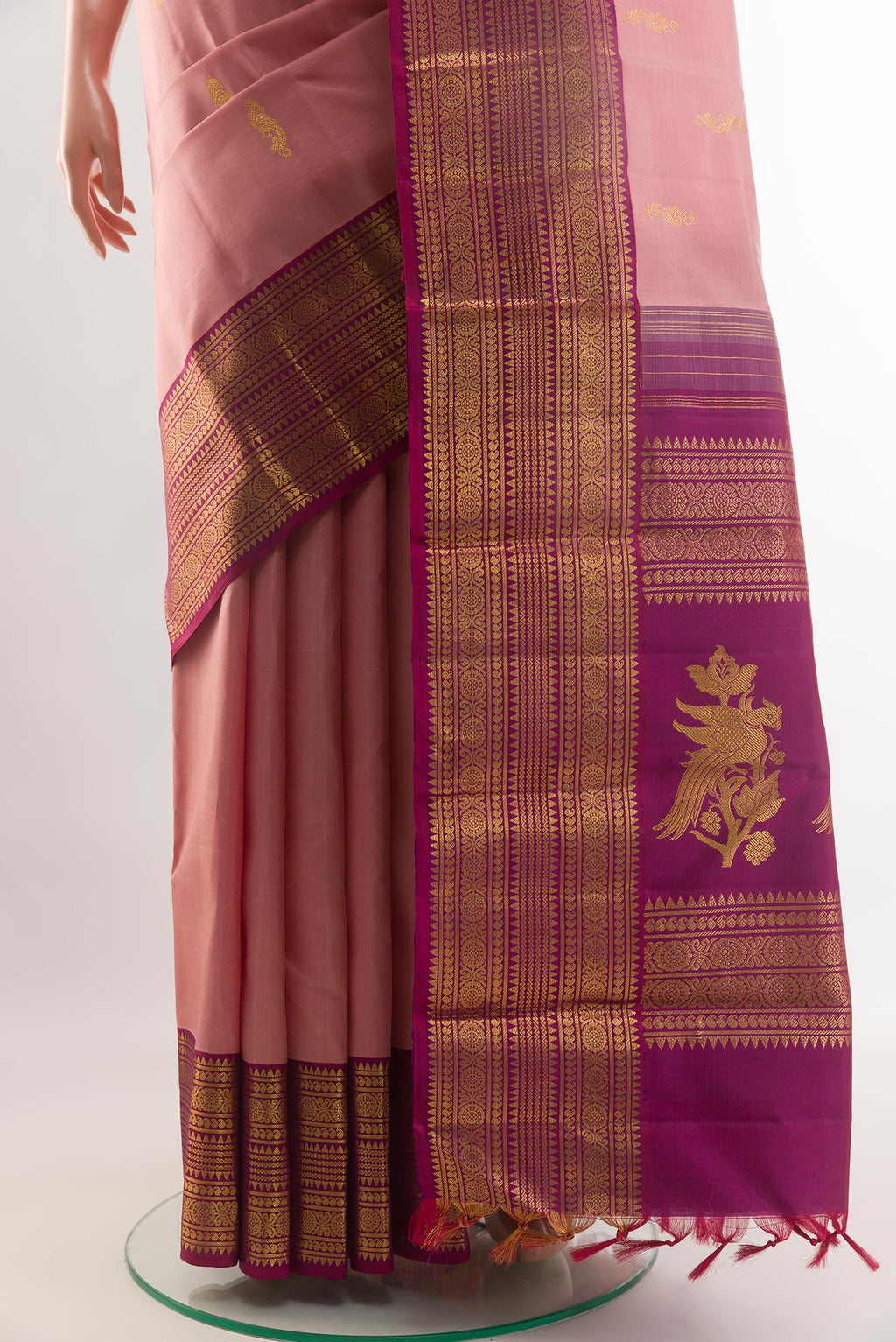 Pleats and pallu of Imperial Pink Kanjivaram Silk Saree with Zari Butta on the body and Zari Border. 