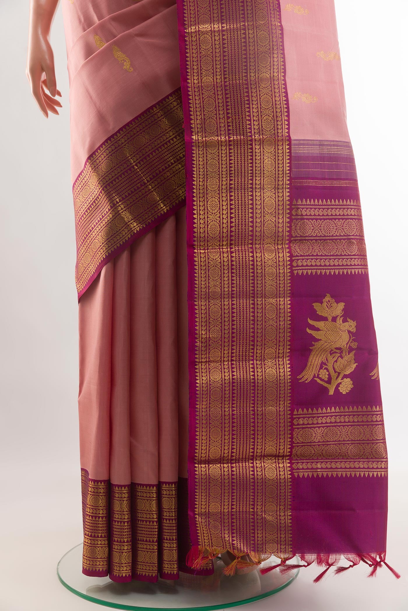 Pleats and pallu of Imperial Pink Kanjivaram Silk Saree with Zari Butta on the body and Zari Border. 