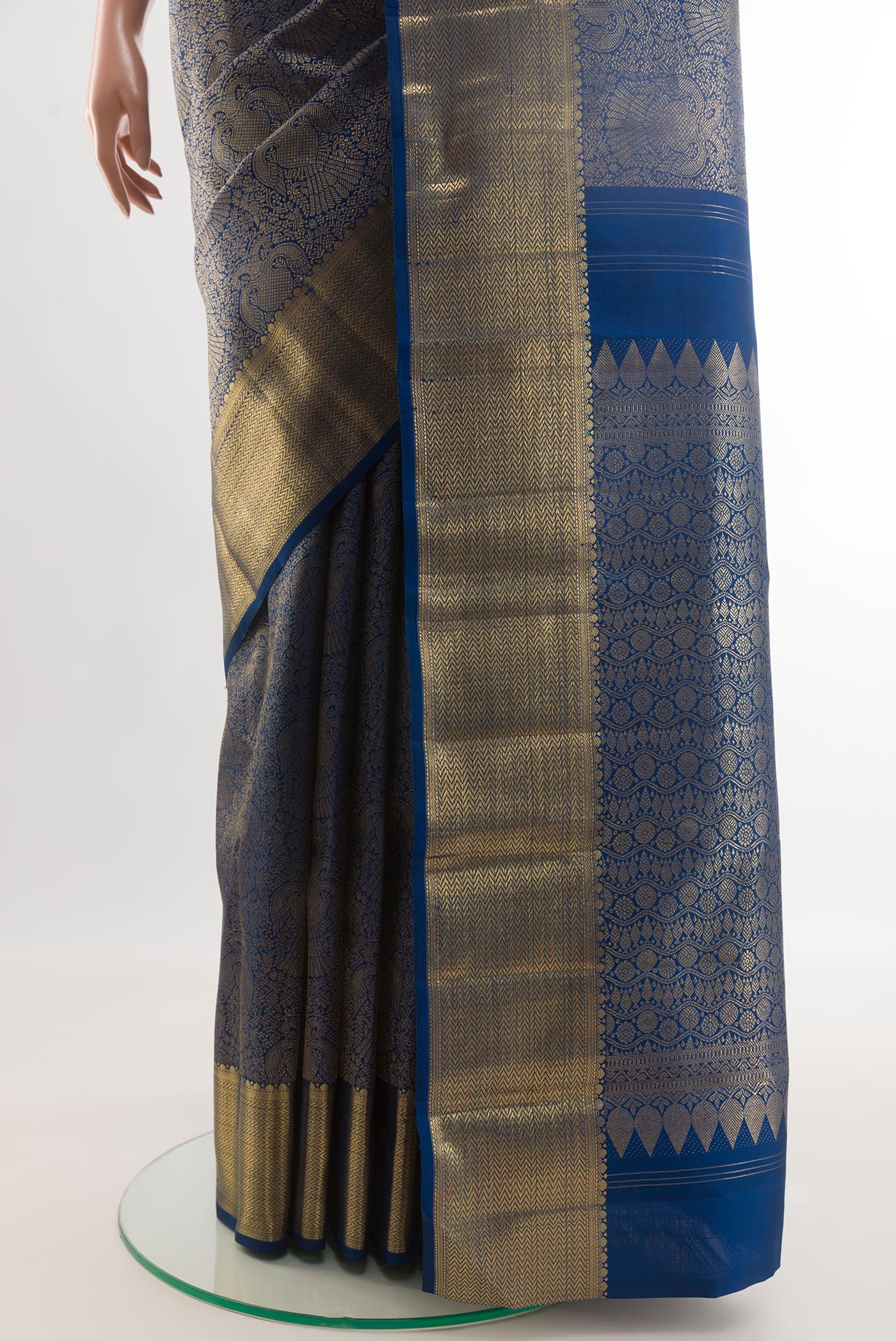 Pleats and pallu of Pure Silk Pure Zari Blue Kanjivaram Saree with Zari Brocade on the body and Zari Border. 
