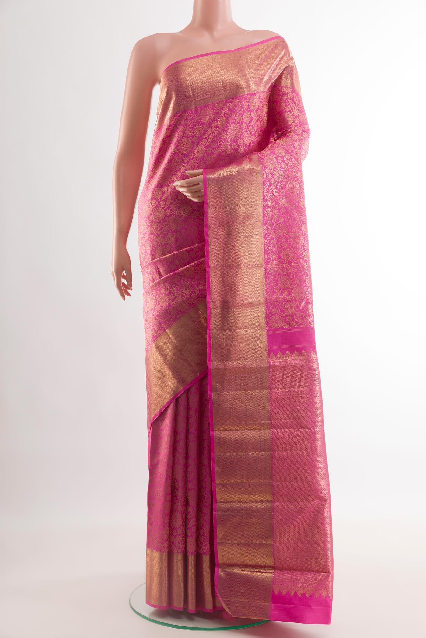 Pure Silk Pure Zari Pink Kanjivaram Saree with Zari Brocade on the body and Zari Border.  displayed on a mannequin