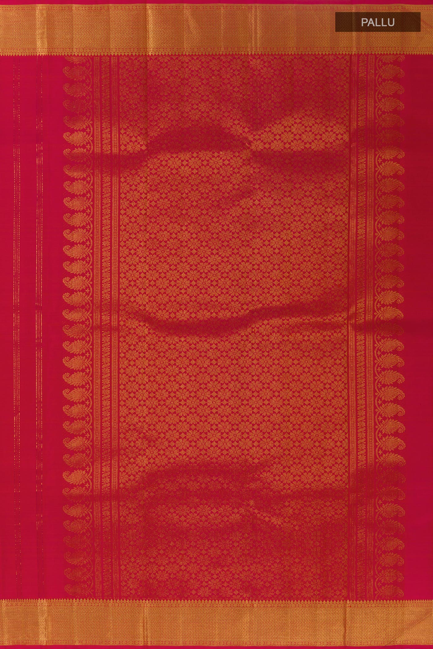 Close up image of the pallu of Pink Kanjivaram Silk Saree with Zari Butta on the body and Zari Border. 