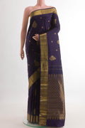 Navy Blue Kanjivaram Silk Saree with Zari Butta on the body and Zari Border.  displayed on a mannequin