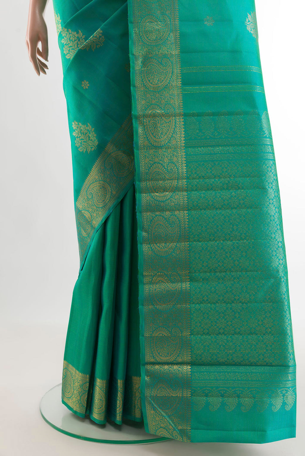 Pleats and pallu of Turquoise Kanjivaram Silk Saree with Zari Butta on the body and Zari Border. 