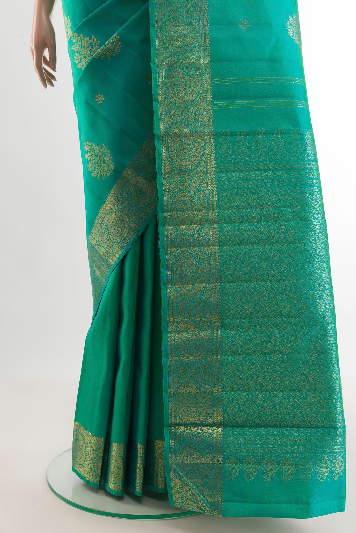 Pleats and pallu of Turquoise Kanjivaram Silk Saree with Zari Butta on the body and Zari Border. 