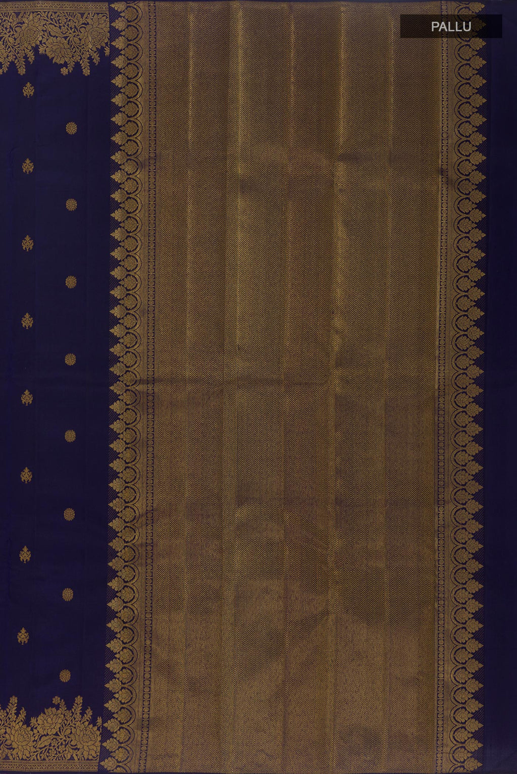 Close up image of the pallu of Navy Blue Kanjivaram Silk Saree with Zari Butta on the body and Zari Border. 