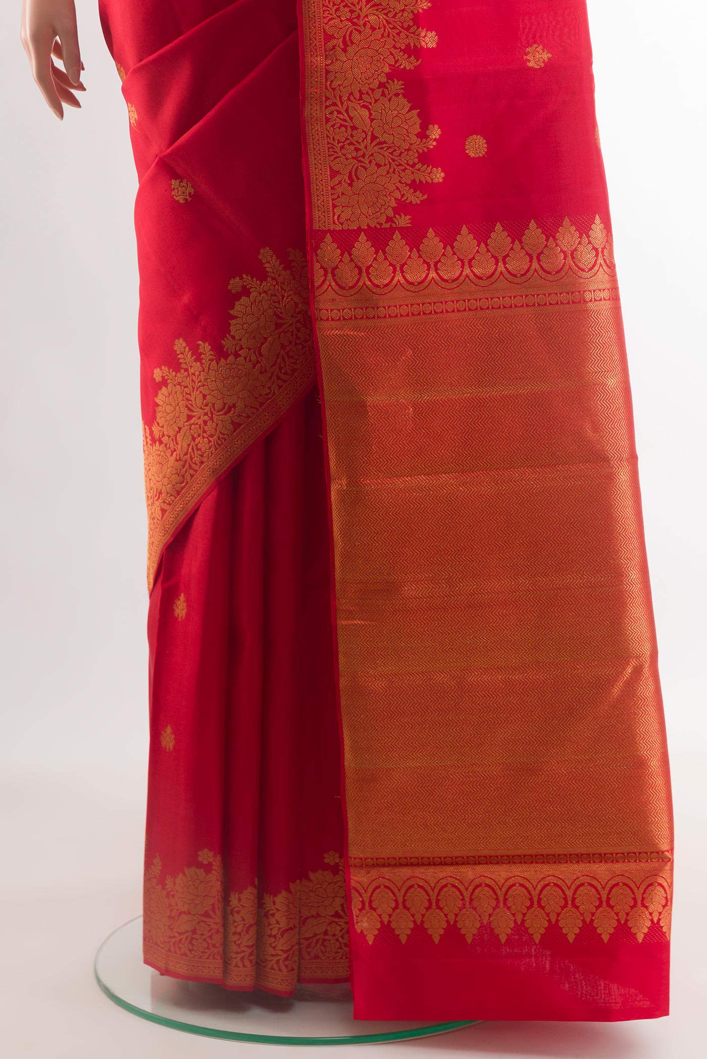 Pleats and pallu of Red Kanjivaram Silk Saree with Zari Butta on the body and Zari Border. 