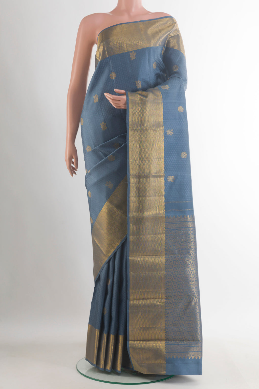 Pure Silk Blue Grey Kanjivaram Saree with Jacquard With Zari Butta on the body and Zari Border.  displayed on a mannequin