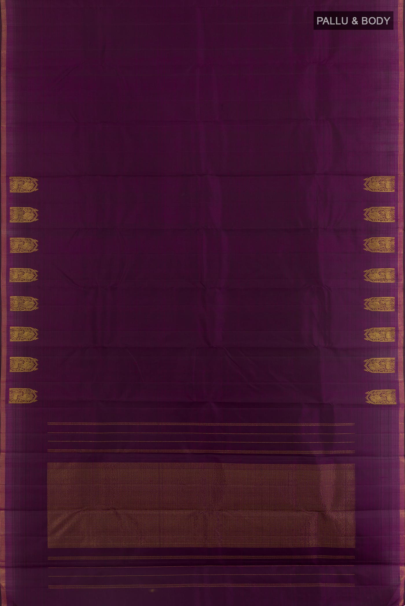 Flat view of Violet Kanchipuram Silk Saree with Plain Body and Zari Border. 