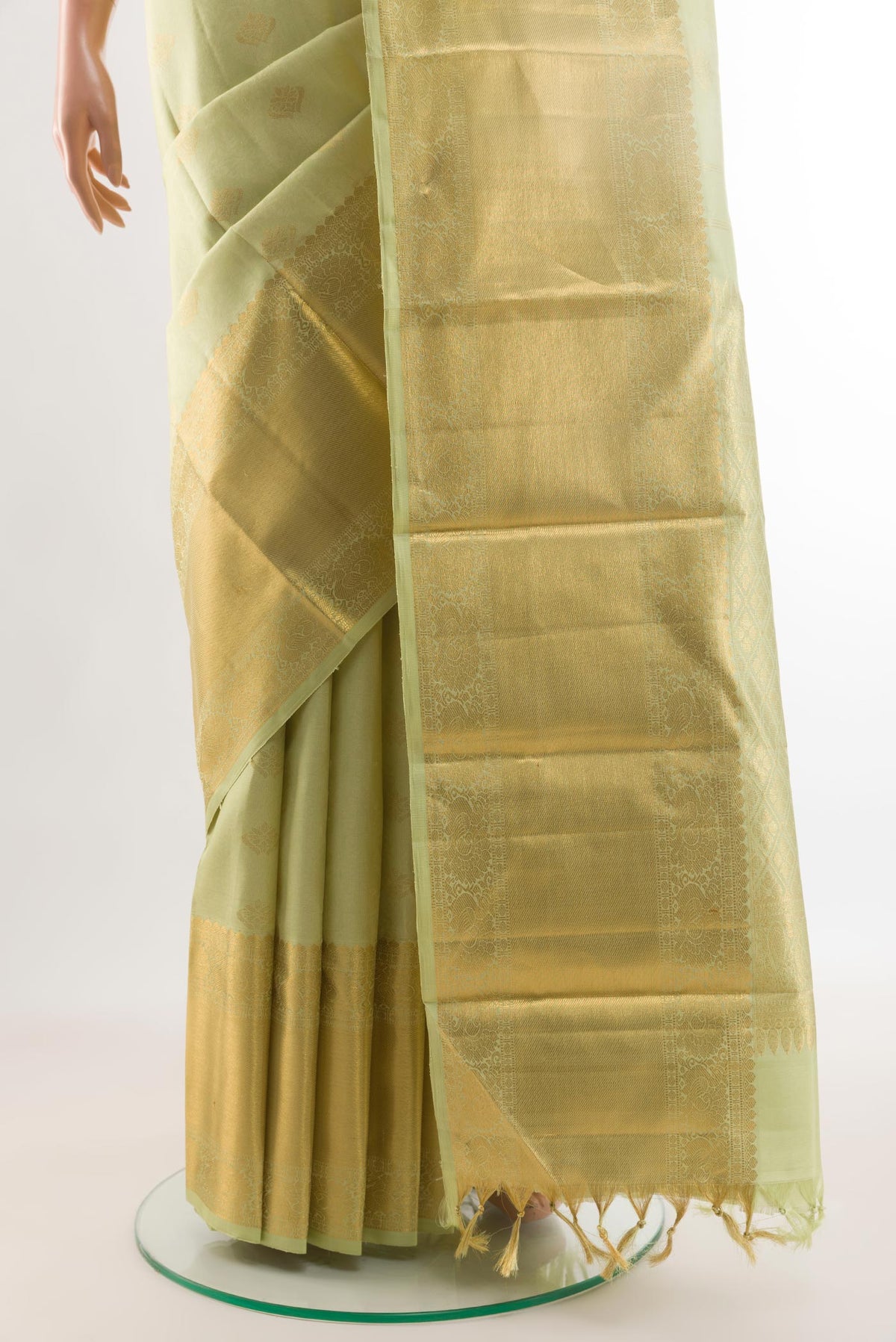 Pleats and pallu of Light Green Kanjivaram Silk Saree with Jacquard With Zari Butta on the body and Zari Border. 