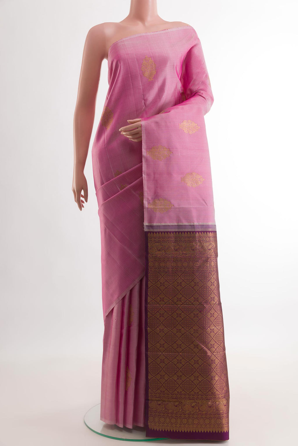 Pink Kanchipuram Silk Saree with Zari Butta on the body and Without Border.  displayed on a mannequin