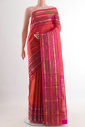 Coral Dual Tone Kanjivaram Silk Saree with Zari Butta on the body and Zari Border.  displayed on a mannequin