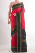 Pure Silk Red Kanjivaram Saree with Plain Body and Zari Border.  displayed on a mannequin