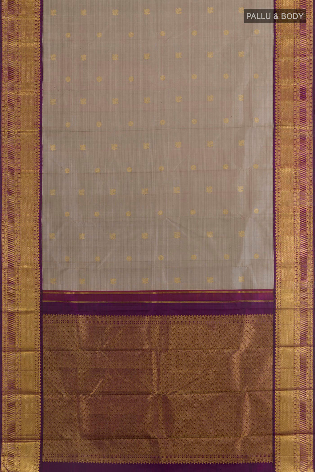 Flat view of Grey Kanjivaram Silk Saree with Zari Butta on the body and Zari Border. 