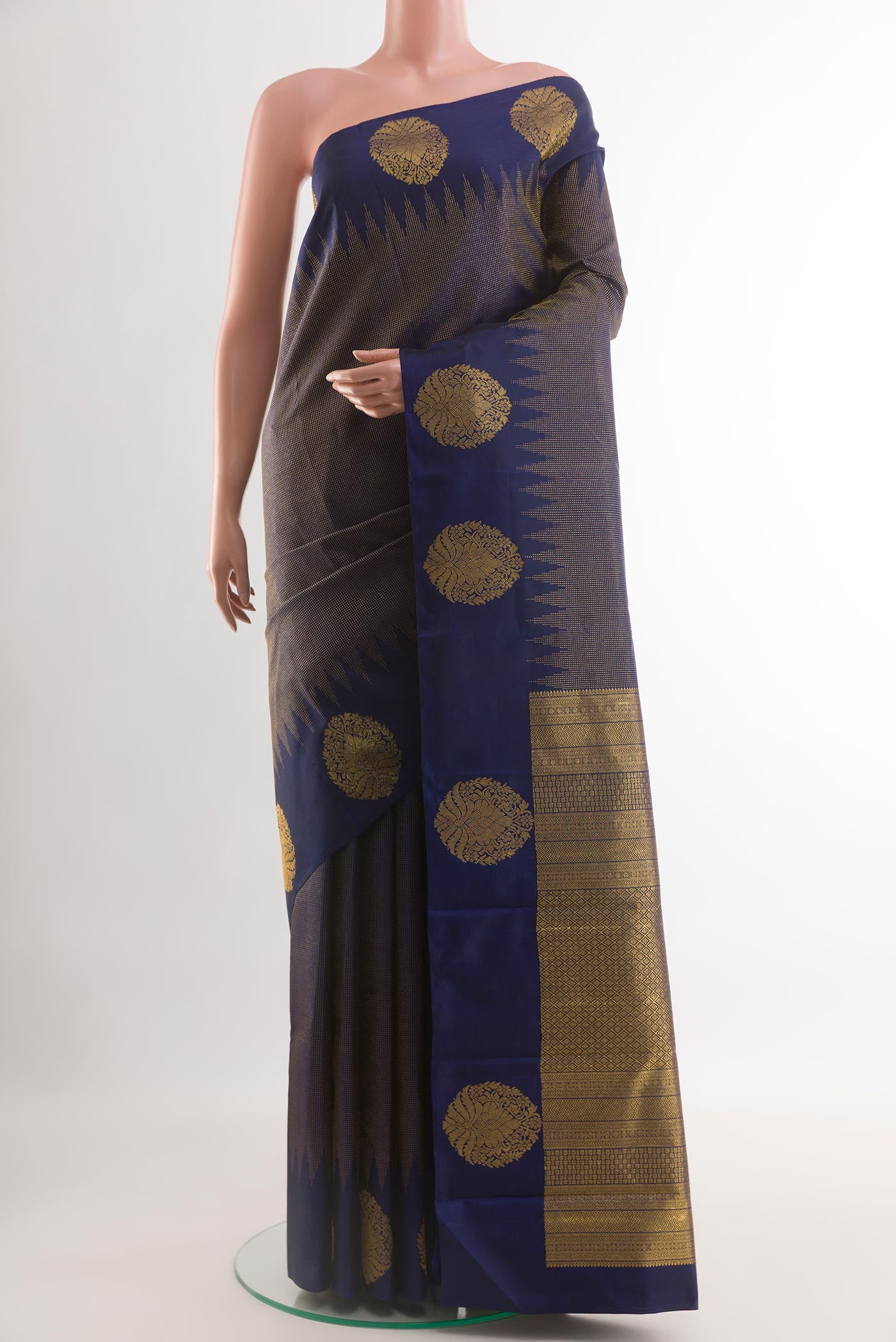 Blue Kanjivaram Silk Saree with Zari Brocade on the body and Zari Border.  displayed on a mannequin