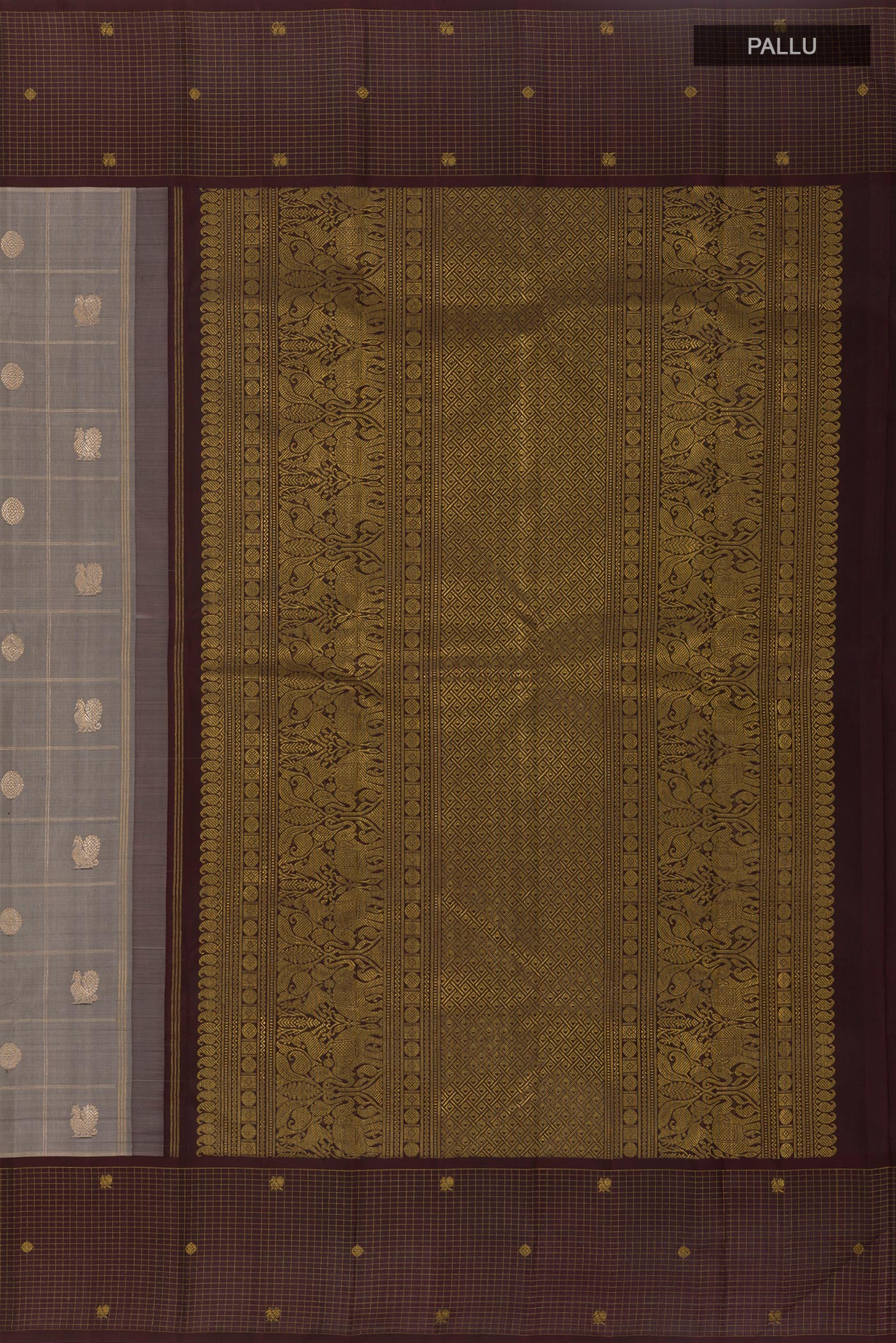 Close up image of the pallu of Grey Kanjivaram Silk Saree with Checked design on the body and Checks Border. 