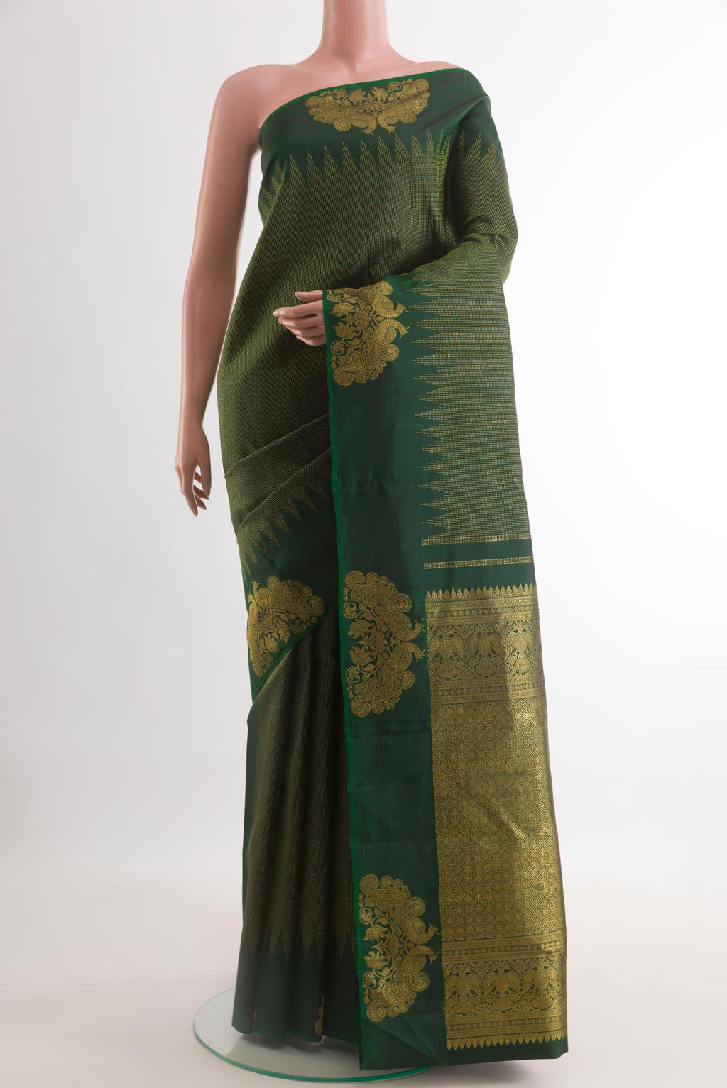 Bottle Green Kanjivaram Silk Saree with Stripes on the body and Fancy Border.  displayed on a mannequin