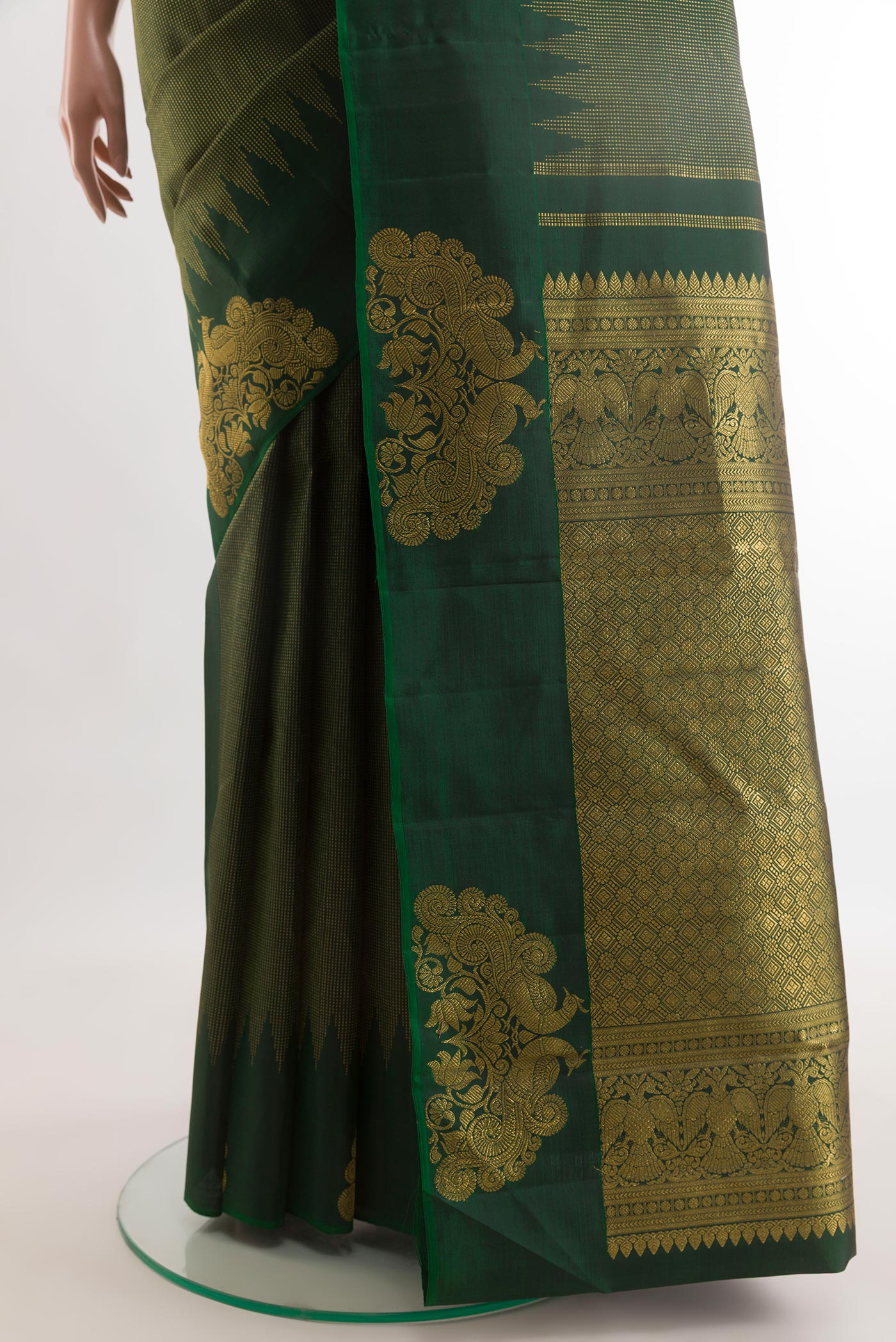 Pleats and pallu of Bottle Green Kanjivaram Silk Saree with Stripes on the body and Fancy Border. 